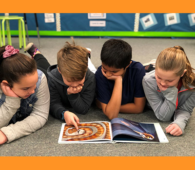 children reading together